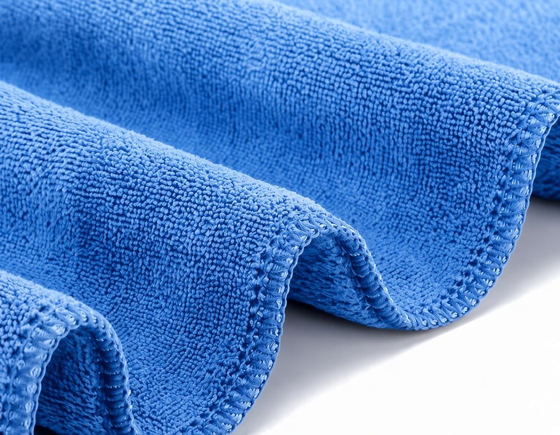 Close-up of blue STRIVEX microfibre gym towel fabric